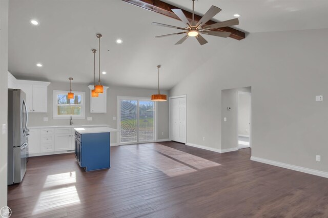1834 Riley Rd, Saint Clair, MI 48079 - kitchen featuring white cabinetry, decorative light fixtures, a center island, dark hardwood / wood-style flooring, and stainless steel fridge