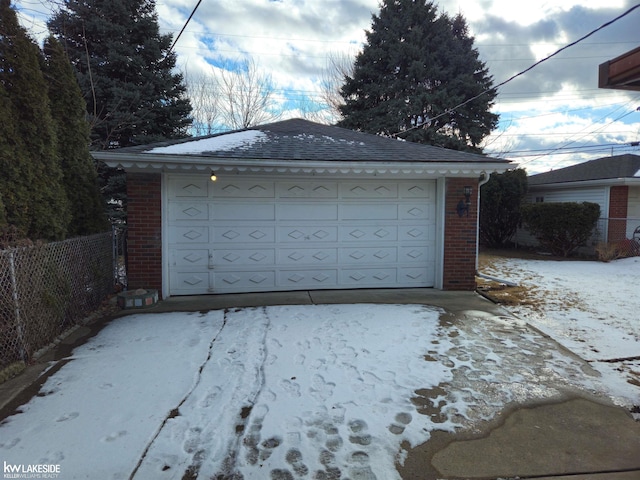 view of snow covered garage