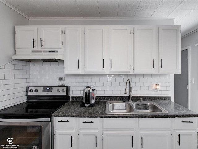 kitchen with sink, decorative backsplash, stainless steel electric stove, and white cabinets