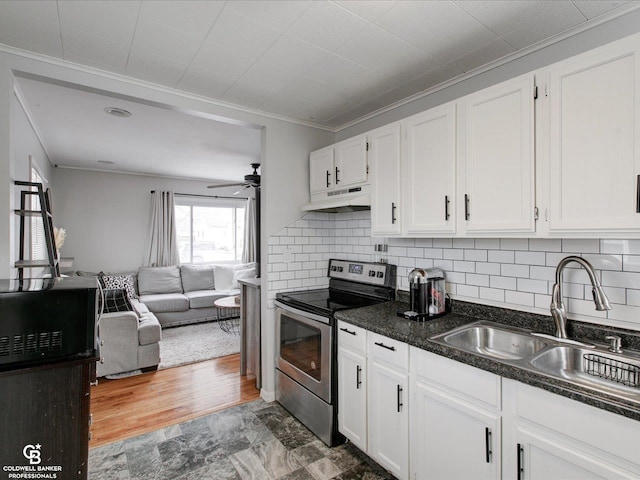 kitchen with sink, crown molding, stainless steel electric range oven, ceiling fan, and white cabinets