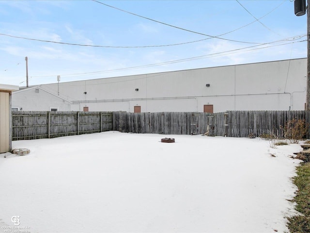 view of yard covered in snow