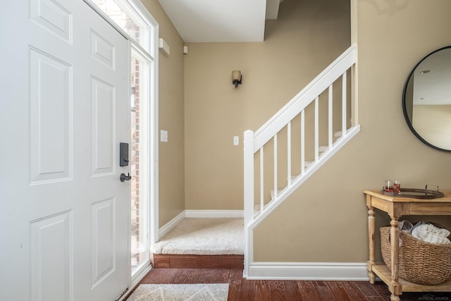 entryway featuring dark wood-type flooring