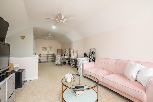 carpeted living room with lofted ceiling