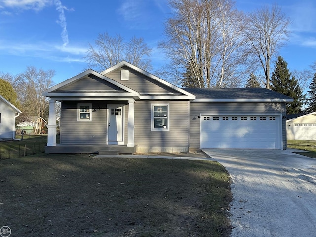 view of front of house featuring a garage and covered porch