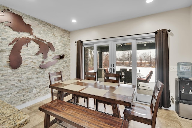 dining space featuring french doors