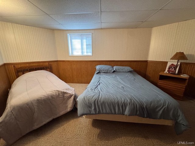 bedroom featuring a paneled ceiling