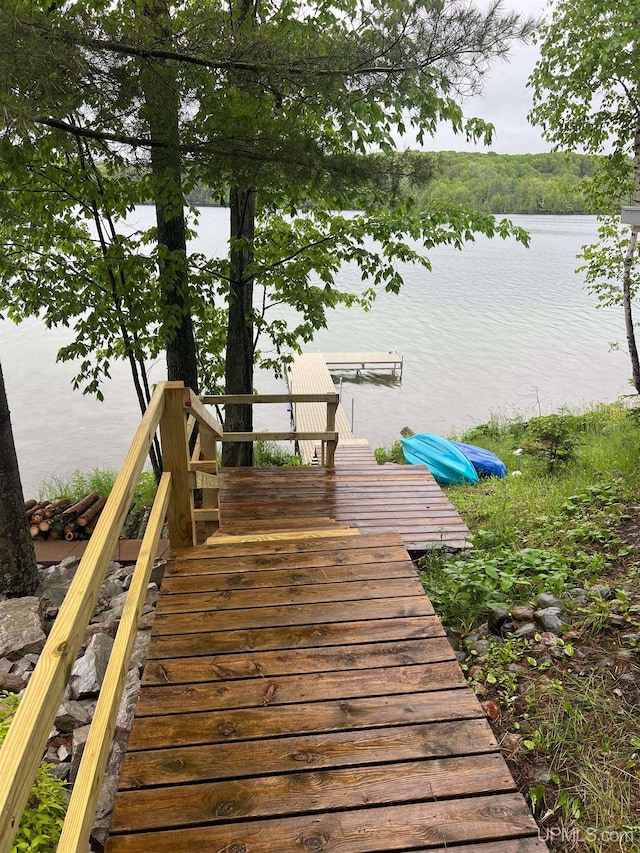 dock area featuring a water view