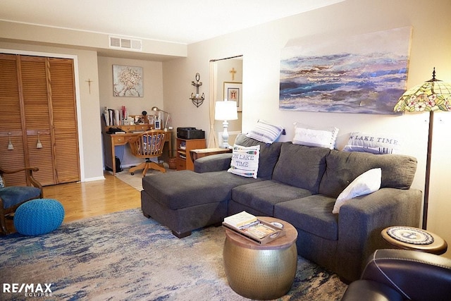 living room featuring hardwood / wood-style flooring