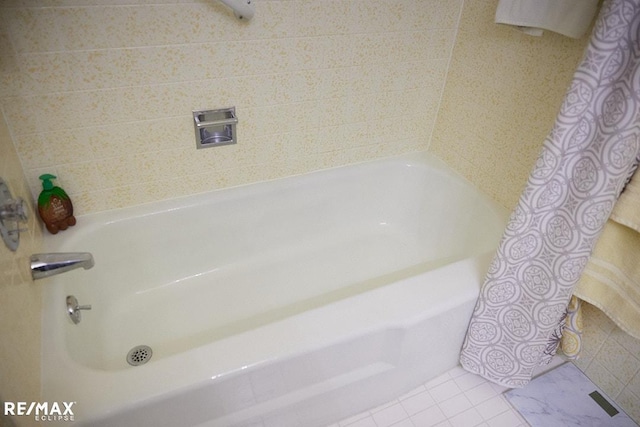 bathroom with tile patterned flooring