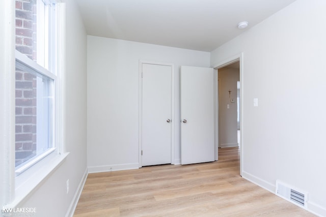 unfurnished bedroom featuring light hardwood / wood-style flooring