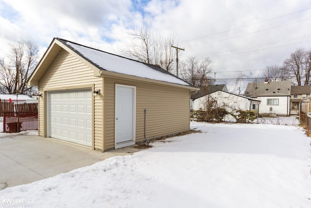 view of snow covered garage