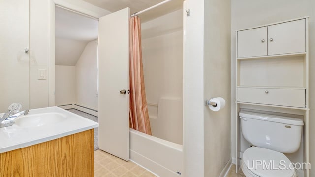 full bathroom featuring vanity, toilet, a baseboard heating unit, and shower / bath combo