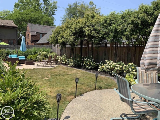 view of yard with a patio area