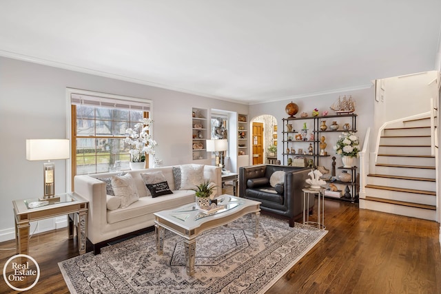 living room featuring dark hardwood / wood-style flooring and crown molding