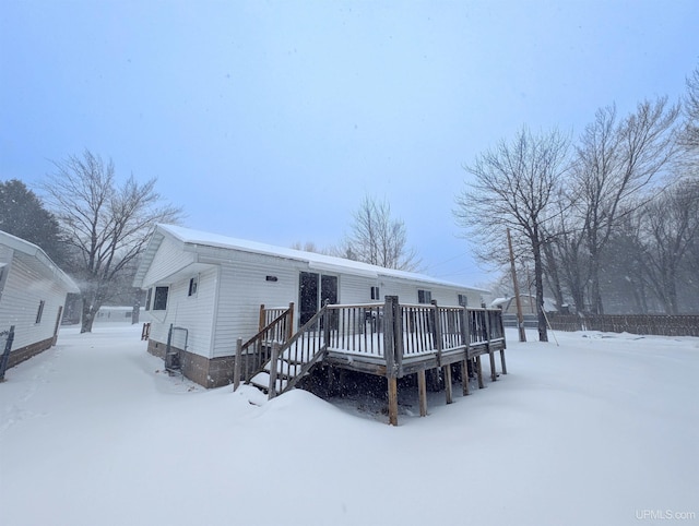 view of front of home with a deck