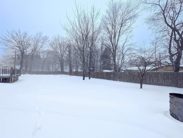 view of yard covered in snow