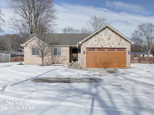 single story home with a garage