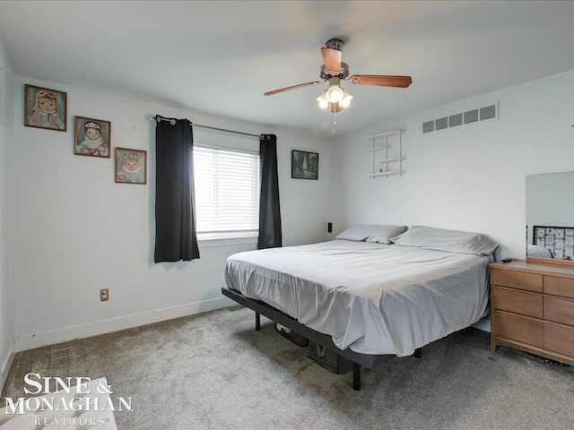 bedroom with light colored carpet and ceiling fan