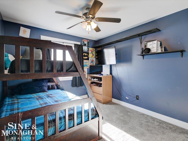 carpeted bedroom featuring ceiling fan