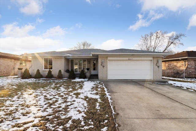 single story home featuring a garage