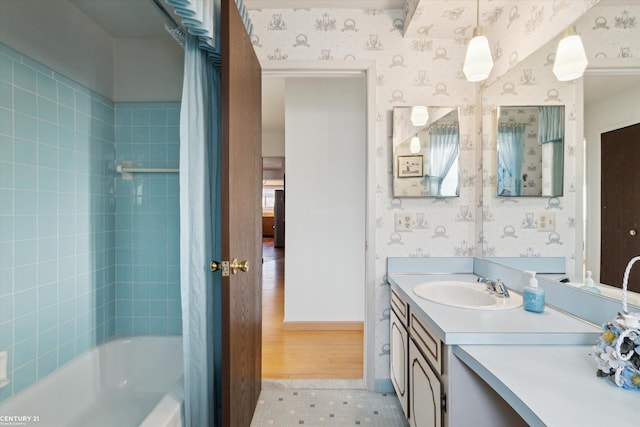 bathroom featuring vanity, tile patterned floors, and shower / tub combo with curtain