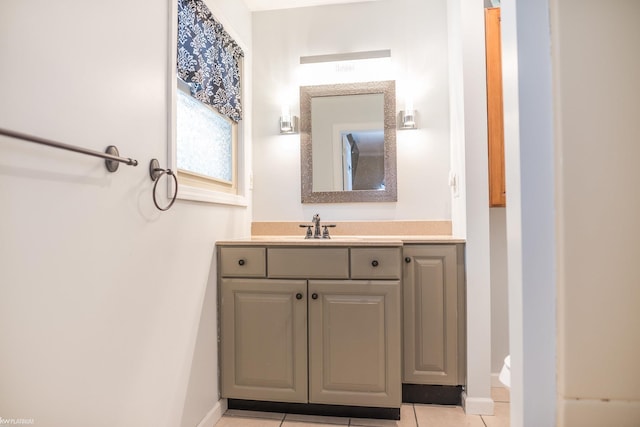 bathroom featuring vanity and tile patterned flooring