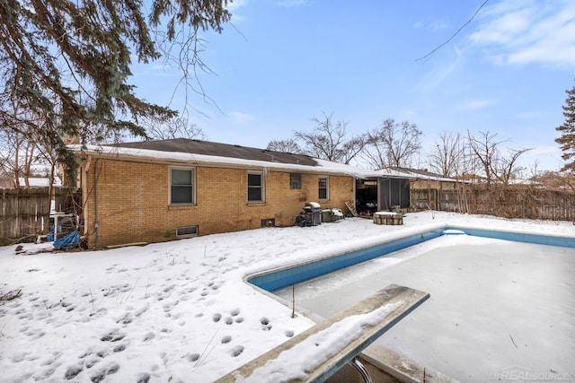 view of snow covered house