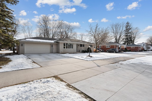 single story home featuring a garage