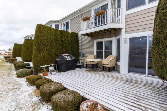 wooden terrace with grilling area