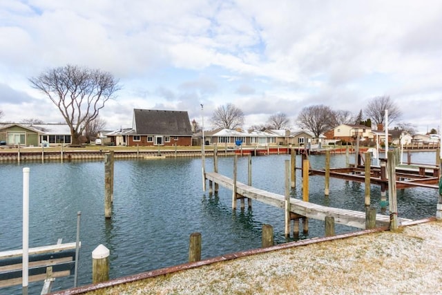 dock area featuring a water view