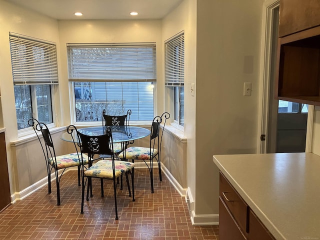 dining space featuring plenty of natural light