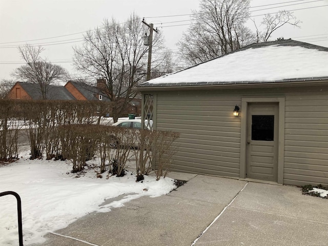 view of snow covered patio