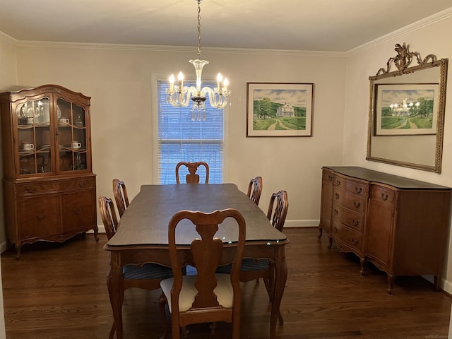 dining space with ornamental molding, dark wood-type flooring, and a chandelier