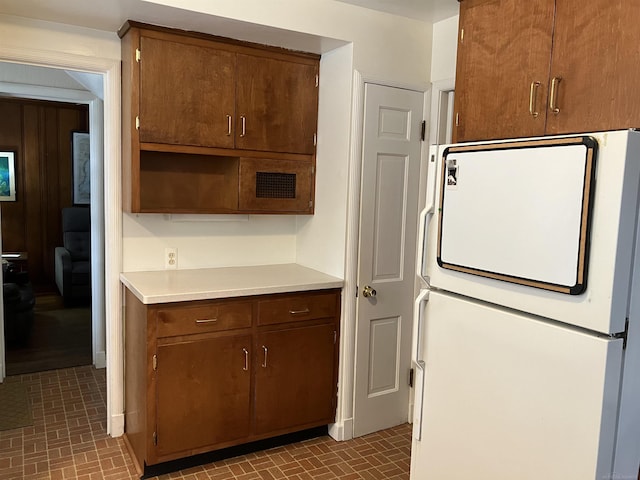 kitchen featuring white refrigerator