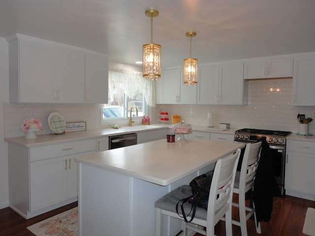 kitchen featuring white cabinets, dishwasher, sink, and stainless steel gas stove