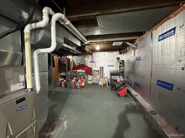 basement featuring heating unit