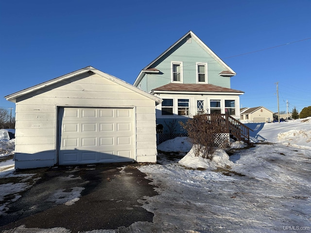 front of property featuring an outbuilding and a garage