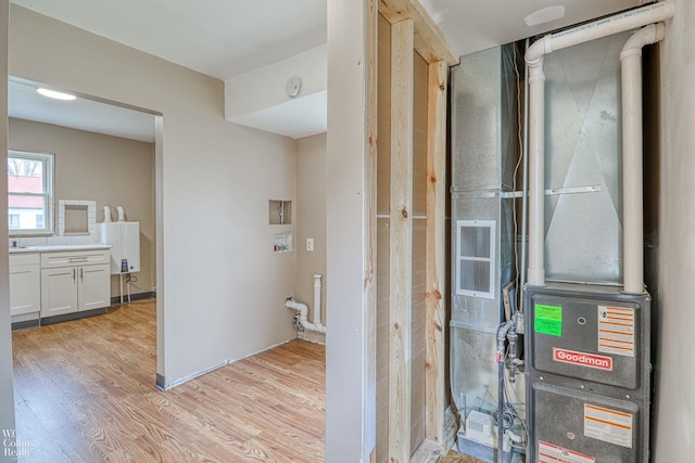 bathroom with hardwood / wood-style floors