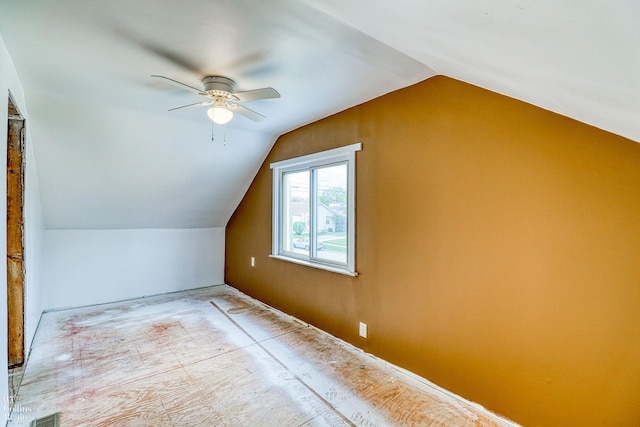 bonus room with vaulted ceiling and ceiling fan