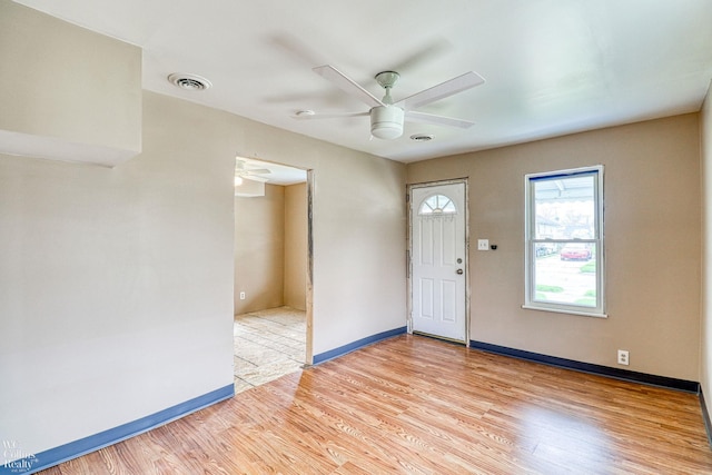 entrance foyer featuring ceiling fan and light hardwood / wood-style flooring