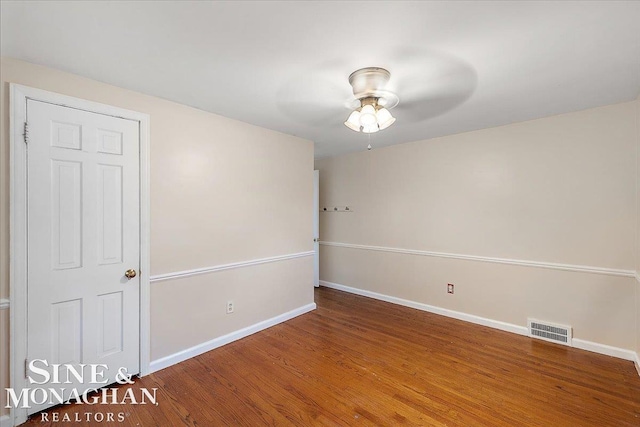 unfurnished room featuring hardwood / wood-style flooring and ceiling fan