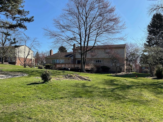 view of yard featuring a deck