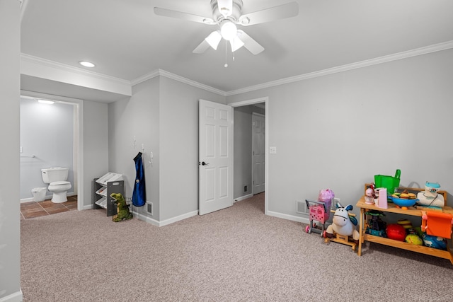 game room with crown molding, carpet floors, and ceiling fan