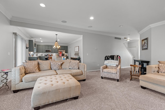 carpeted living room with ornamental molding and a notable chandelier