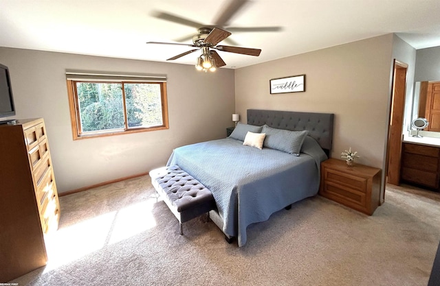 bedroom with light colored carpet and ceiling fan