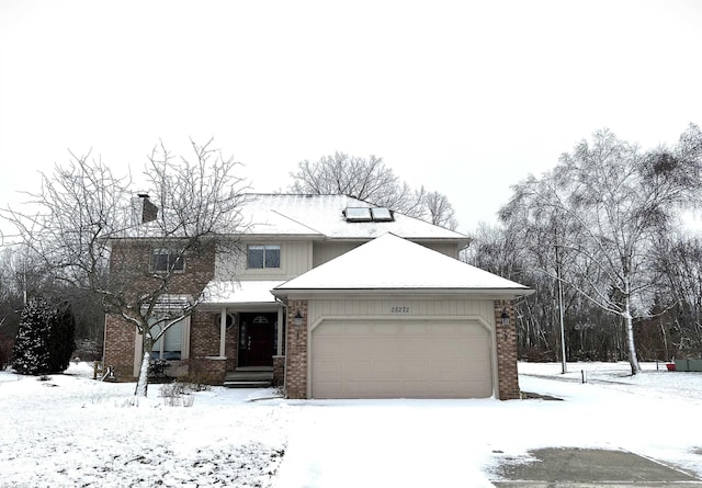 view of front of home with a garage