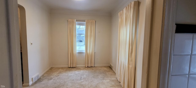 view of carpeted spare room