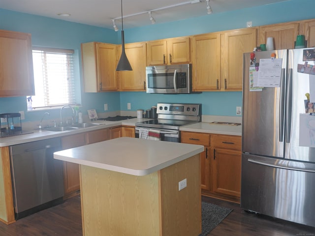 kitchen featuring a sink, a kitchen island, stainless steel appliances, light countertops, and dark wood-style flooring