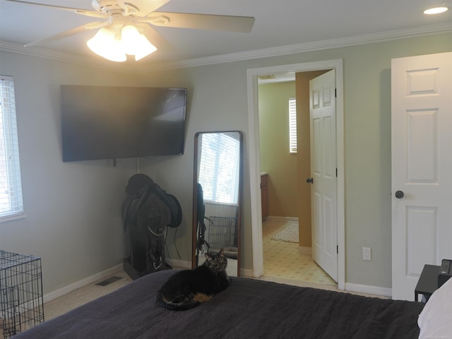 bedroom with visible vents, baseboards, ceiling fan, and crown molding