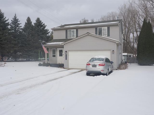 front of property featuring a garage